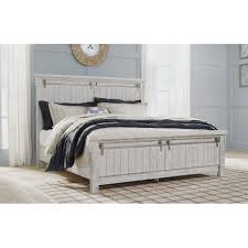 A traditional king size mattress (a.k.a. Brashland White California King Panel Bed