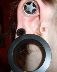 ear piercing to a larger gauge