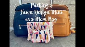 What S In My Purse Packing The Fawn Design Mini