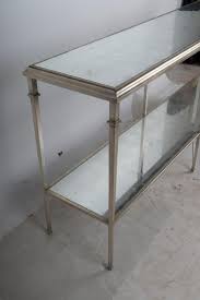 Dust with a soft damp cloth or soap and water. Sold Price Silver Leaf Mirrored Two Tier Console Table June 4 0120 10 00 Am Pdt