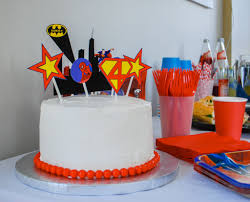 You can even use non edible superhero figures on the cake. Easy Super Hero Birthday Cake With Printable Cake Toppers Merriment Design