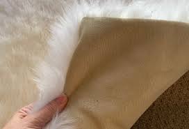 pet sheepskin rug um white