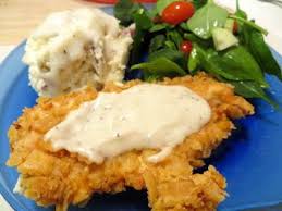 Dredge chicken again in flour mixture, shaking off excess. Paula Deen S Chicken Fried Chicken Smashed Potatoes And Milk Gravy Chicken Recipes Recipes Food