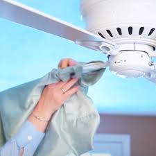 to clean a ceiling fan with a pillow case