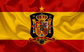 Spain national football team logo with national flag in the backdrop. Download Wallpapers Spain National Football Team Emblem Logo Football Federation Flag Europe Flag Of Spain Football World Cup For Desktop Free Pictures For Desktop Free