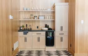 light oak pantry cabinets with honed