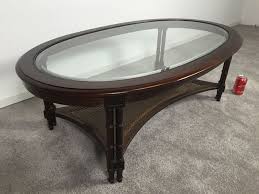 We did not find results for: Hollywood Regency Oval Coffee Table With Glass Top And Cane Lower Shelf Bamboo Motif