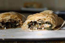 In this recipe from the balkans, you'll fill sheets of phyllo dough with a creamy feta and cottage cheese mixture and roll into spirals. Stuffed Mushroom Phyllo Roll Mango Kale Salad Oh She Glows