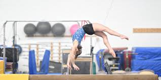 washu club gymnastics vaults to the top