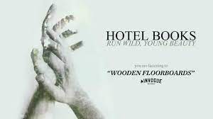 hotel books wooden floorboards you