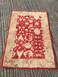 cream traditional style area rug