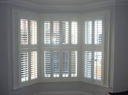 Pairing shutters with drapery panels adds an appealing design element and lets you add complementary colors to your room's décor. Best Window Shutters Interior Shutters Bay Window Shutters House Blinds