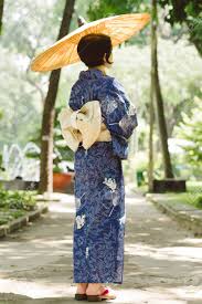 My daily mourning routine before going off to work in tokyo, japan.instagram: Japanese Woman In Traditional Dress Enjoying Nature In The Park Stock Photo Picture And Royalty Free Image Image 73108960