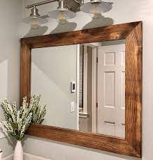 A traditional wood framed mirror gives off a rural or rustic vibe on any bathroom. Amazon Com Shiplap Rustic Wood Framed Mirror 20 Stain Colors Reclaimed Rustic Styled Wood Big Bathroom Mirror Large Over Sink Vanity Mirror Mirror For Wall Primitive Wood Wall Mirror Handmade