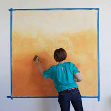 paint a stenciled ombre wall mural