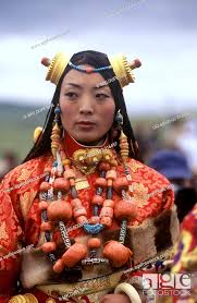 Female Khampa wears gold hair pieces & gau boxes, zee stones & coral at the  Litang Horse Festival -..., Stock Photo, Picture And Rights Managed Image.  Pic. UIG-60000-02-316457 | agefotostock