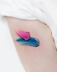 watercolor style brush stroke tattoo