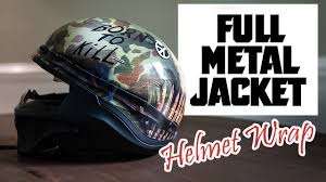 vinyl wrapping a motorcycle helmet