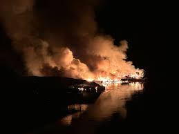 fire destroys over 20 boats part of