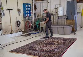 clean an area rug with a pressure washer