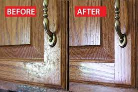 If your cabinets are really grimy, let the cleaner sit for up to 10 minutes after spraying. How To Clean Grease From Kitchen Cabinet Doors Hunker Cleaning Hacks Diy Cleaning Products Household Cleaning Tips