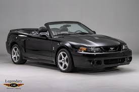 Upholstery came in opal gray leather, opal gray cloth, and black cloth. 2003 Ford Mustang Svt Cobra Desirable Black On Black Only 4035 Miles Since New