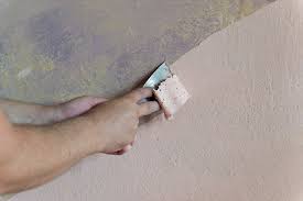 properly paint over a painted wall