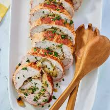 apple stuffed pork loin cooking with