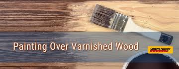 can you paint over varnished wood