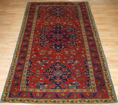 antique turkish star ushak design rug