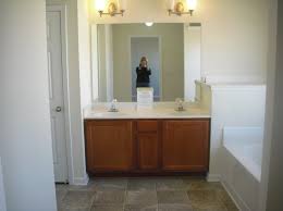 frame a builder grade bathroom mirror