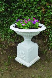 pair of large cast iron garden urns on