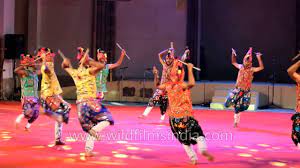 gujarati folk dancers perform garba