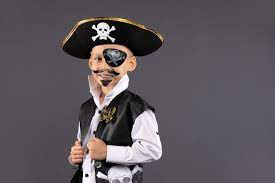 little boy dressed as a pirate with