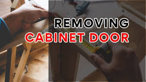 a cabinet door for cleaning or painting