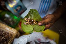 street seller flavors a betel nut leaf
