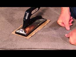 remove hot melt adhesive from carpet