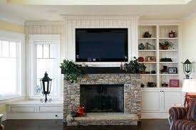 install my tv over my fireplace