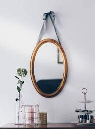 tips on how high to hang a mirror