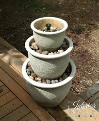 This tutorial is from 'a piece of rainbow' and we are in love with this little patio outdoor water garden. How To Turn Plant Pots Into A Water Fountain Interior Frugalista