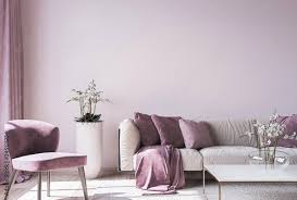 modern sofa on light pink wall