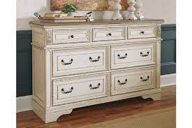 Whether you need a space to get ready in front of the mirror or need a temporary double vanity solution, you're sure to find the right combination with our wide selection. Realyn 7 Drawer Dresser Ashley Furniture Homestore