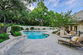 Backyard Concrete Patio With Retaining