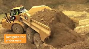 An articulated hauler, articulated dump truck (adt), or sometimes a dump hauler, is a very large heavy duty type of dump truck used to transport loads over rough terrain, and occasionally on public roads. Cat 740 Articulated Dump Truck Machine Review Youtube