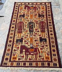 handmade afghan war rug tribal style