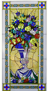 stained glass window with flowers in a vase