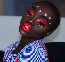 bold makeup is flawless on dark skin
