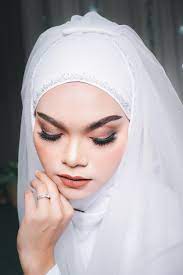 white wedding dress and hijab headscarf