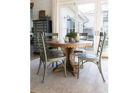Luxury dining room furniture design. Magnolia Home Top Tier Round Dining Table By Joanna Gaines Living Spaces