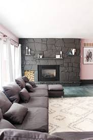 Update A Rock Fireplace By Using Paint